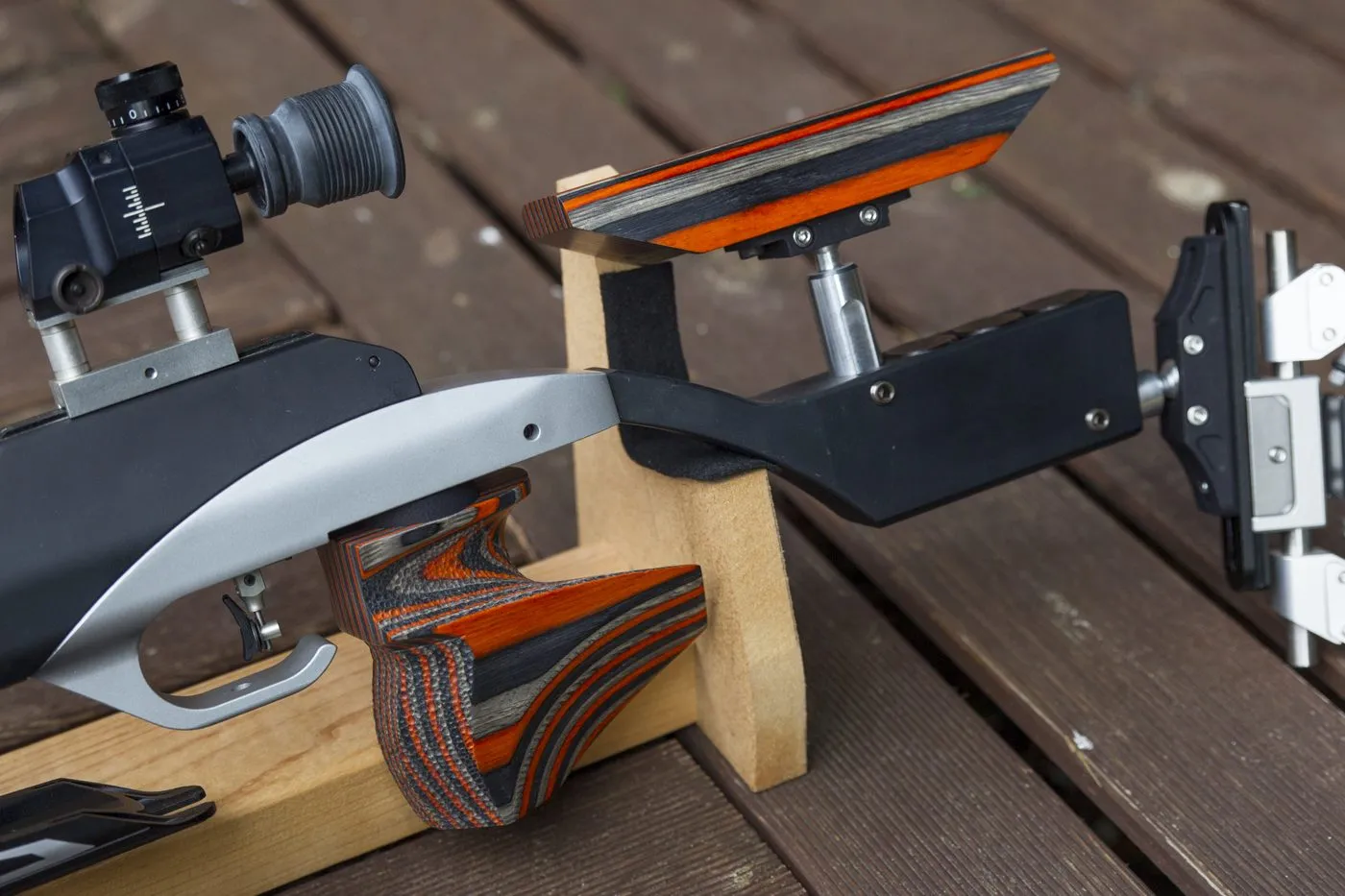 Steyr LG100 10m grip set in orange and silver laminate